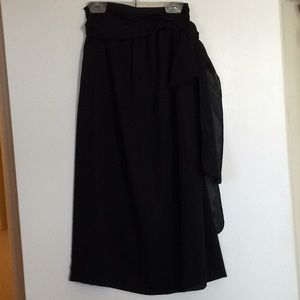 Black polyester skirt.